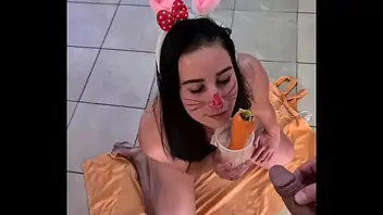 Bunny slut eating a piss covered carrot