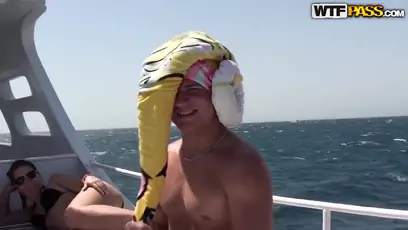 Three total hotties pose on a luxurious yact